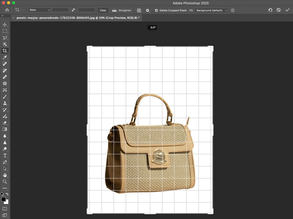 Screenshot of Photoshop displaying the Crop tool, highlighting how to adjust the angle of an image by clicking and dragging.