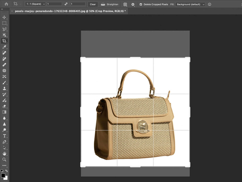 Adobe Photoshop workspace featuring the rule of thirds overlay to assist in perfecting image crop adjustments.