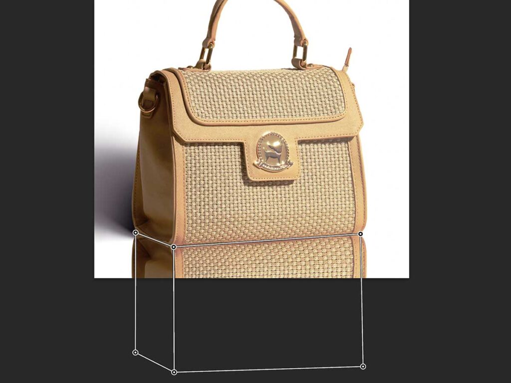 Click 'Warp' on the top toolbar and drag the outer points to align with the product shape, mimicking the tucked area.