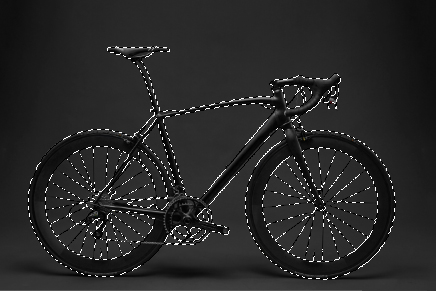 A black and white image of a bicycle, inviting viewers to click and select the subject for further editing.