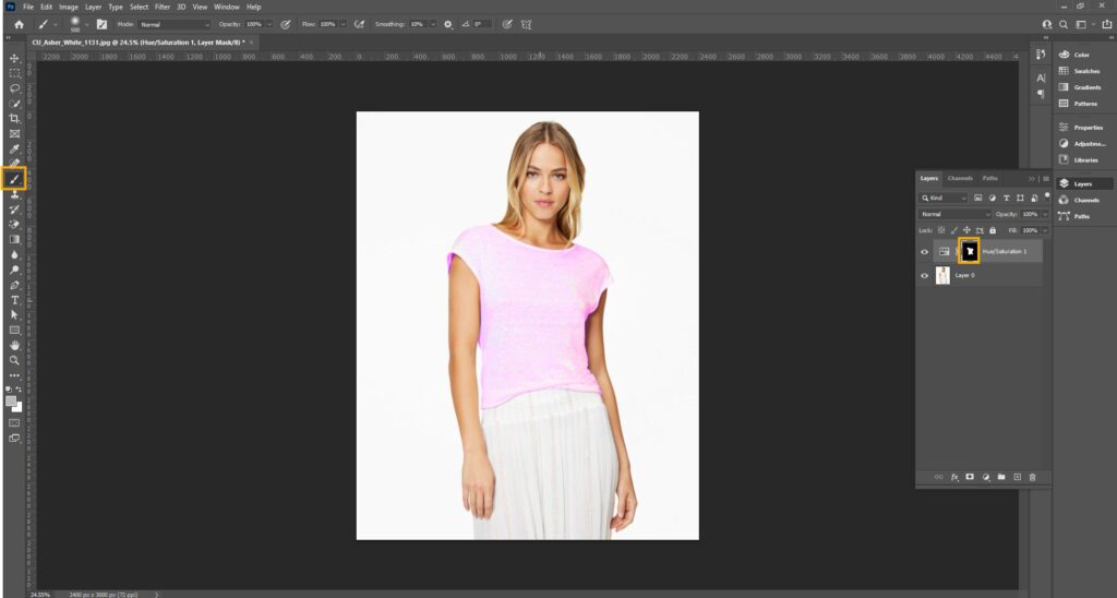 Image of Adobe Photoshop editing, focusing on refining a layer mask using brush tools for precise adjustments.