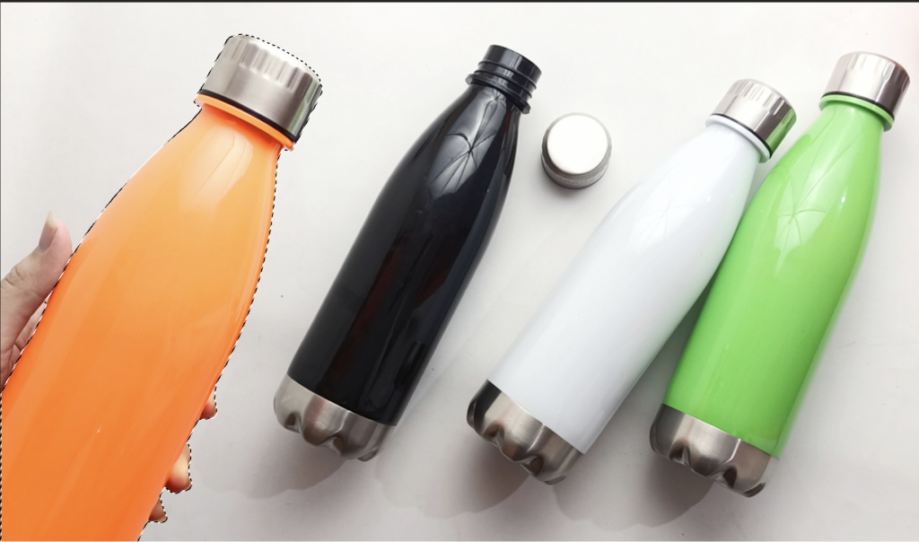 Three water bottles in different colors with lids, showcasing vibrant hues for enhanced product appeal in commercial photography.