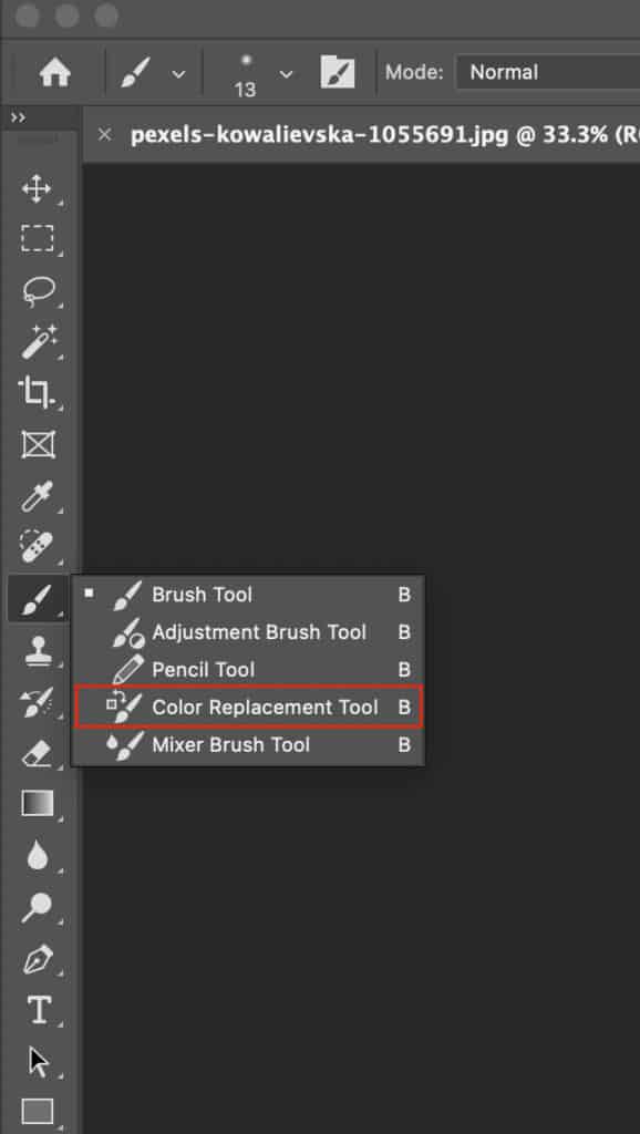 Select the color replacement tool