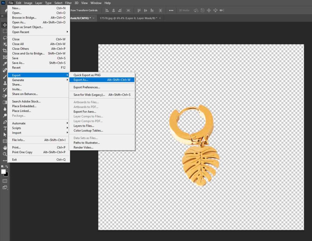 Gold leaf is being applied to the jewelry image, enhancing its design before saving the edited version.