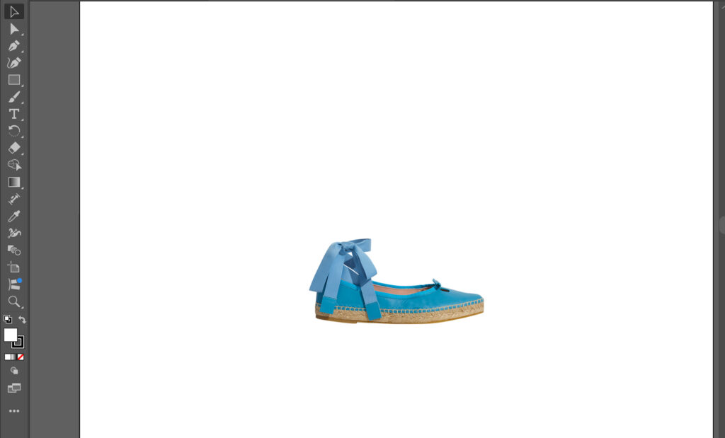 A shoe adorned with a bow, displayed in Illustrator, illustrating design techniques for a clipping mask in Illustrator.