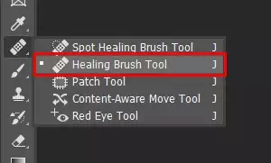 Select the healing brush tool